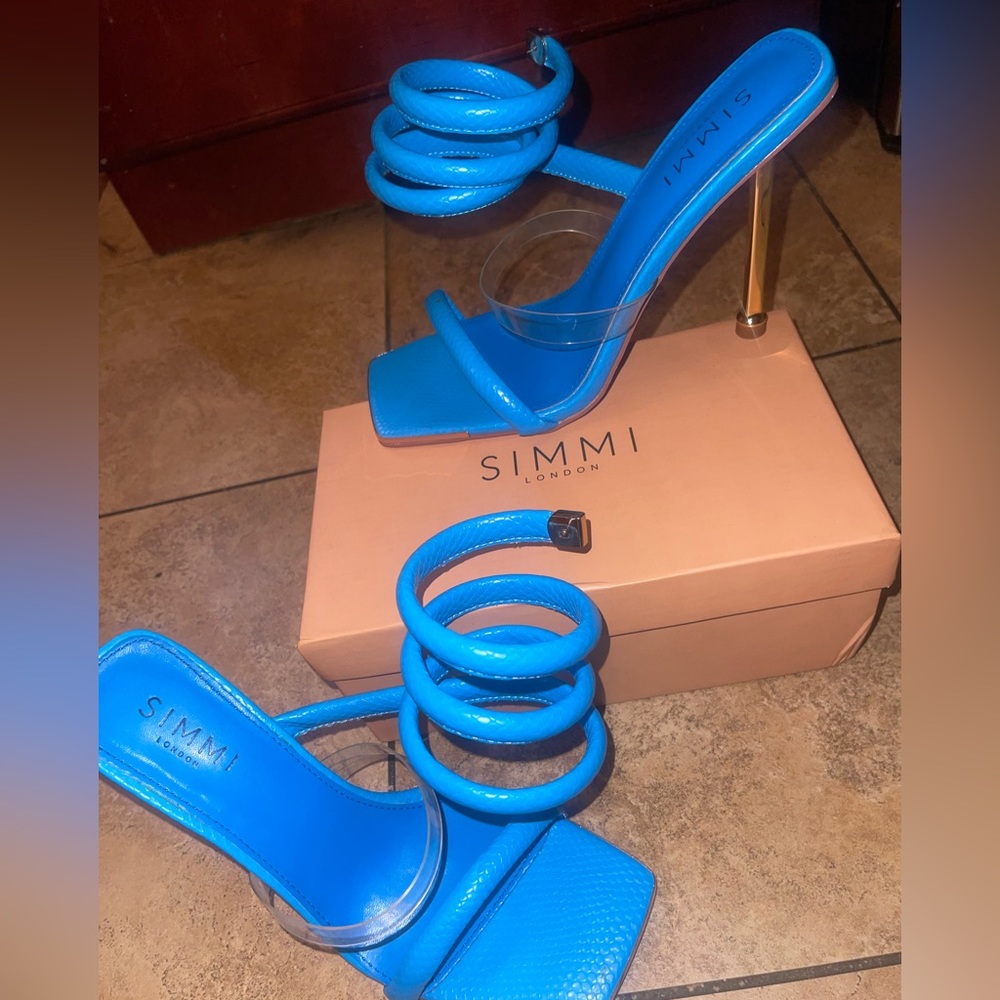 stargaze blue faux snake spiral stiletto heels
size: US 8 UK 6 EU 39
Never worn